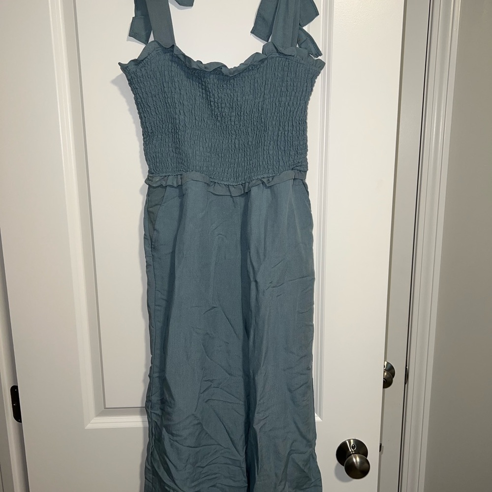 Blue Jumpsuit with tied sleeves